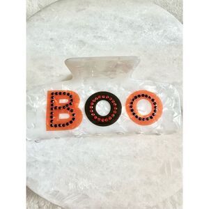 Halloween “BOO” white hair claw with black and orange colors and rhinestones ￼￼